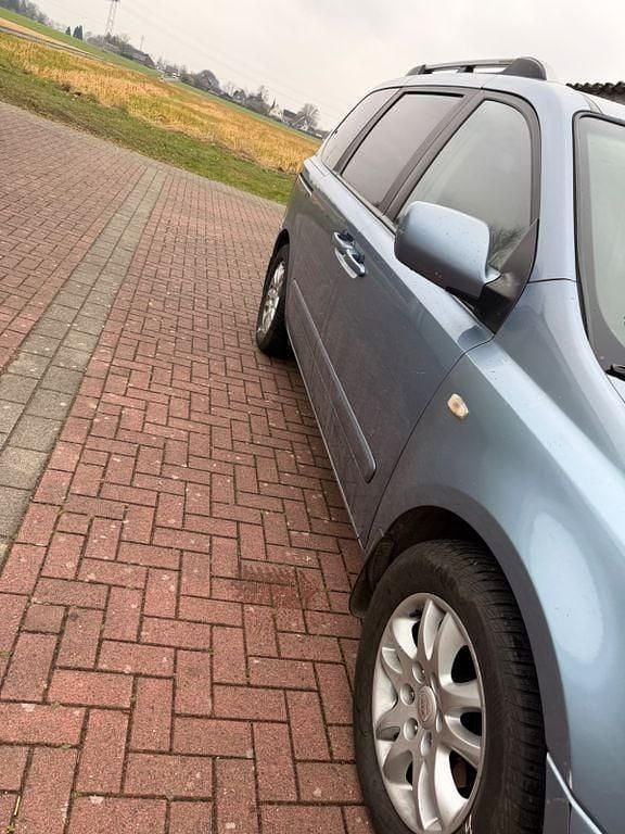 Gebraucht Kia Carnival EX 185 PS (136 kW) 2007 Blau Van / Kleinbus