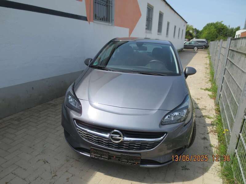 Grau Gebraucht 2015 Opel Corsa Selection Limousine | 6.790 € (Fairer Preis) - Bild 1/4