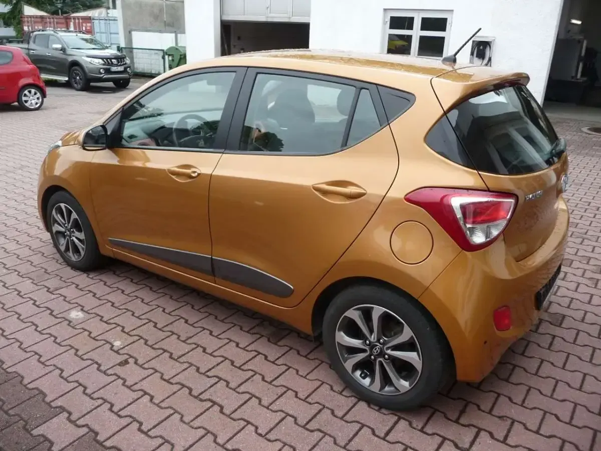 Gebraucht Hyundai i10 Style 87 PS (63 kW) 2016 Orange Kleinwagen