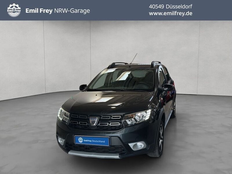 Kometengrau metallic Gebraucht 2018 Dacia Sandero Celebration Kleinwagen | 8.970 € (Fairer Preis) - Bild 1/3