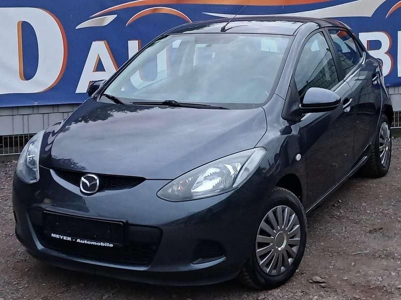 Grau Gebraucht 2011 Mazda 2 Kleinwagen | 4.290 € (Fairer Preis) - Bild 1/4