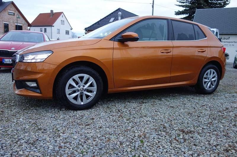Gebraucht Skoda Fabia Selection 116 PS (85 kW) 2024 Phoenixorange metallic Kleinwagen