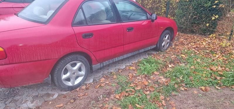 Rot Gebraucht 1996 Mitsubishi Carisma Limousine | 1.300 € (Guter Preis) - Bild 1/4