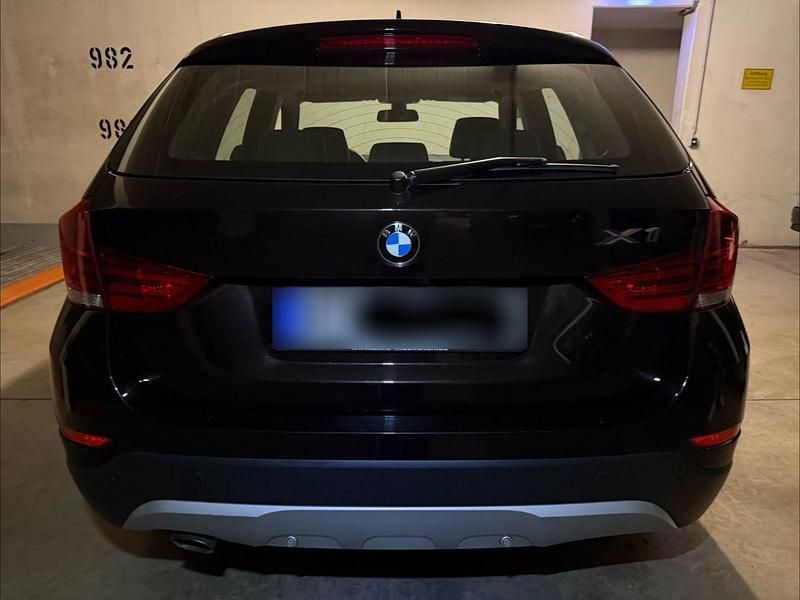 Używany BMW X1 Advantage 143 KM (105 kW) 2014 Brązowy SUV
