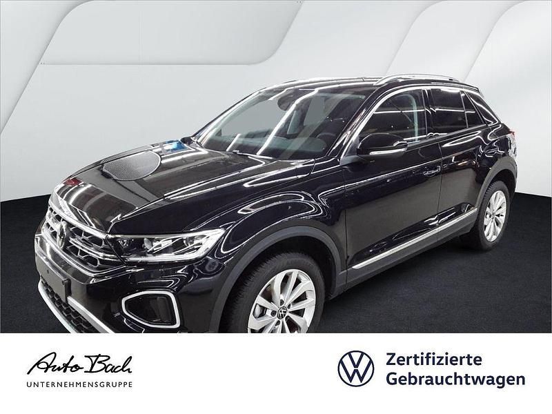Schwarz (deep black perleffekt) Gebraucht 2024 VW T-Roc Pro SUV | 29.940 € (Fairer Preis) - Bild 1/4