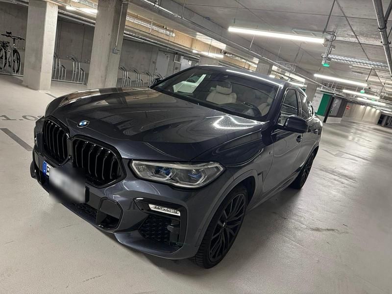 Grau Gebraucht 2021 BMW X6 M50 Performance SUV | 53.600 € (Superpreis) - Bild 1/4
