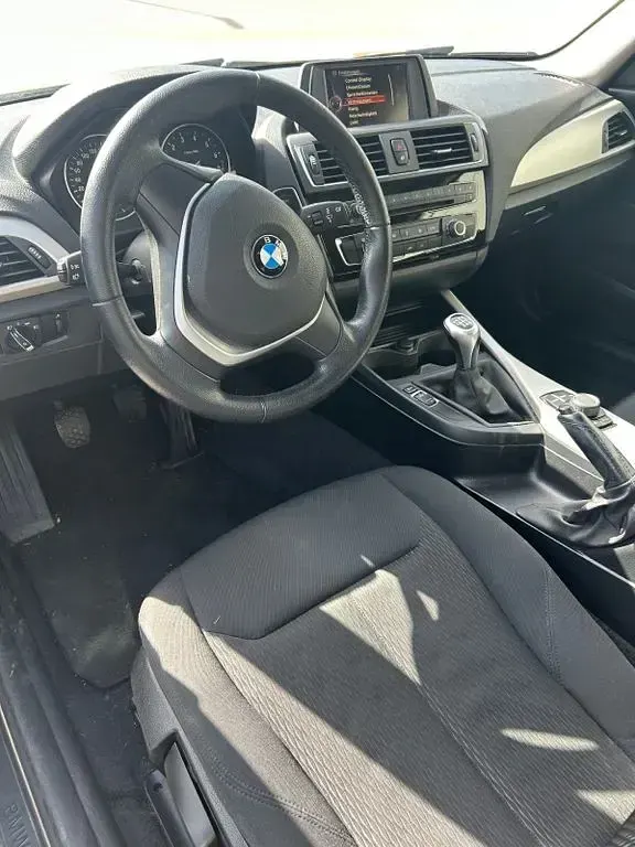 Używany BMW 116 109 KM (80 kW) 2016 Czarny Hatchback