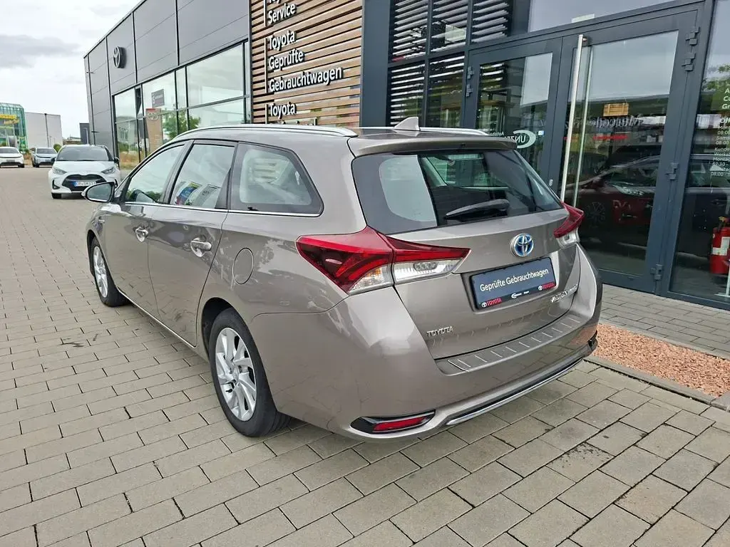 Gebraucht Toyota Auris Hybrid Edition 135 PS (99 kW) 2016 Braun Kombi