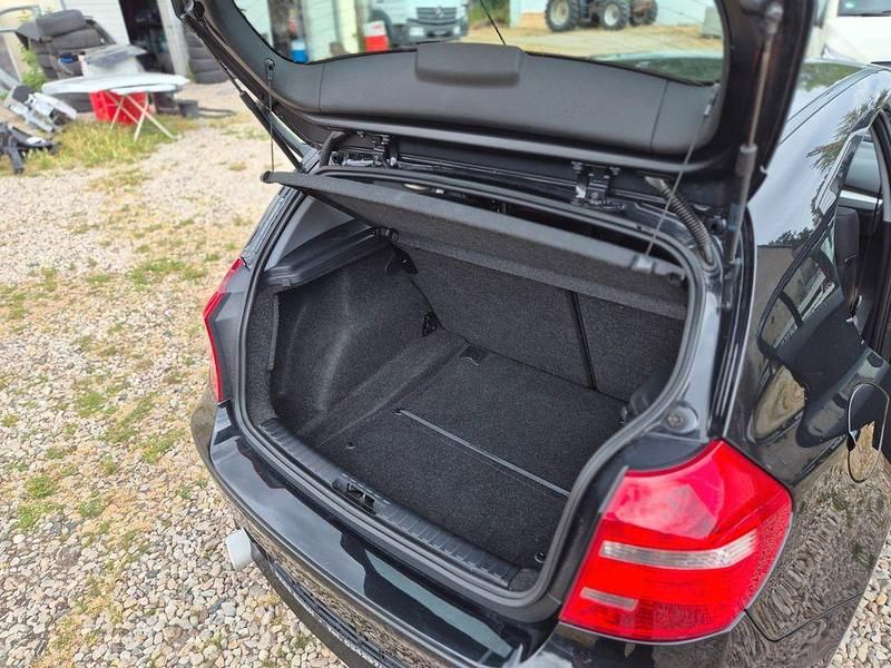 Second-hand BMW 116 122 CP (89 kW) 2009 Negru Hatchback