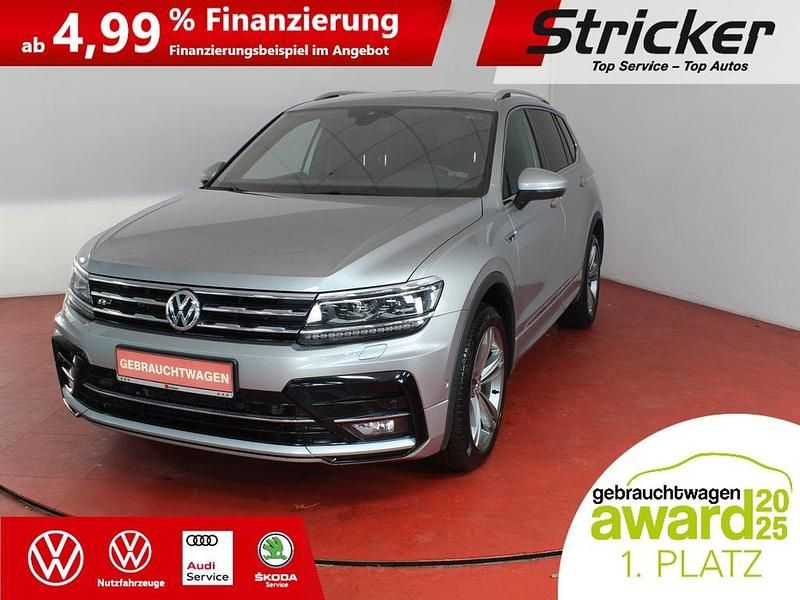 Pyritsilber metallic Gebraucht 2021 VW Tiguan Allspace R-line SUV | 29.949 € (Superpreis) - Bild 1/4
