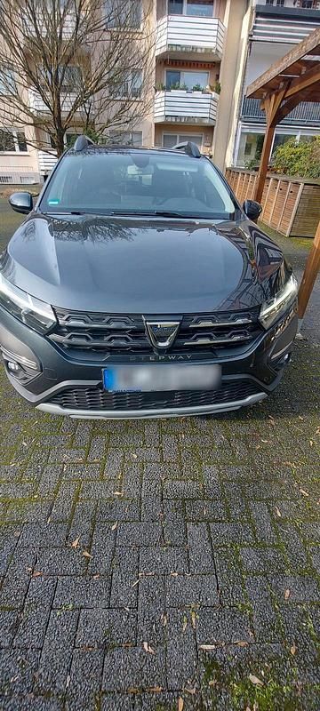 Grau Gebraucht 2021 Dacia Sandero Stepway Limousine | 9.999 € (Guter Preis) - Bild 1/4