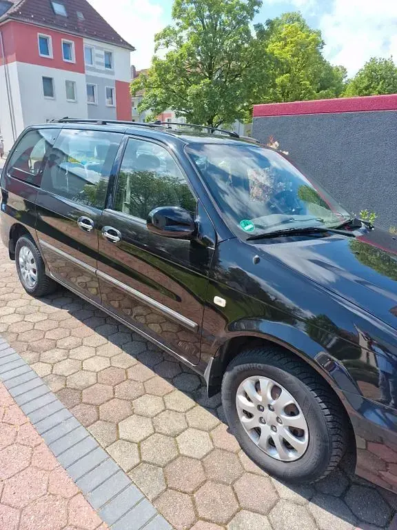 Gebraucht Kia Carnival EX 144 PS (105 kW) 2006 Schwarz Van / Kleinbus