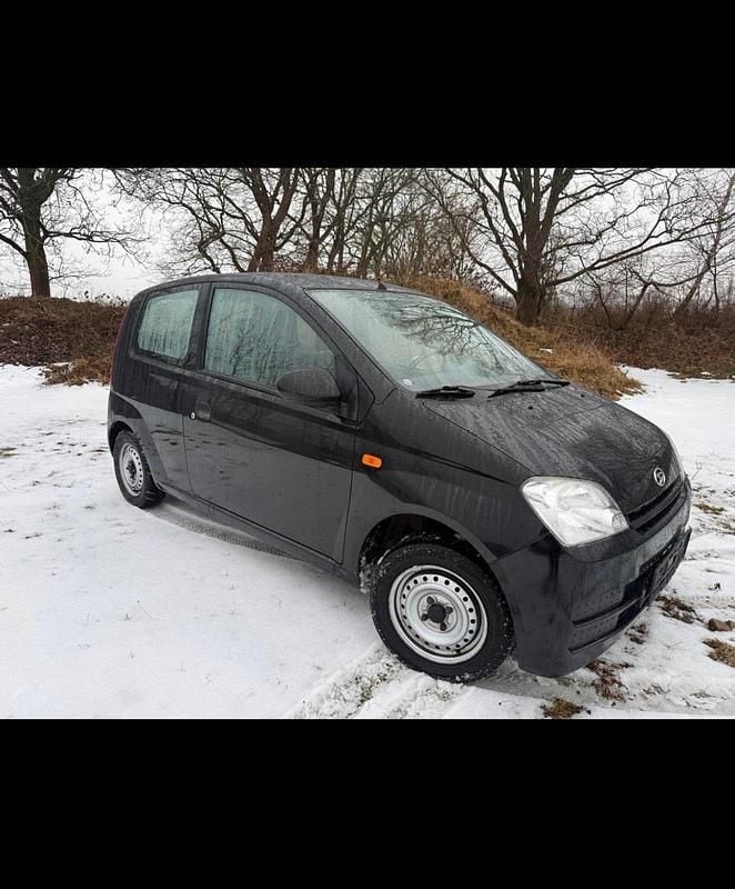 Gebraucht Daihatsu Cuore 59 PS (43 kW) 2006 Schwarz Kleinwagen