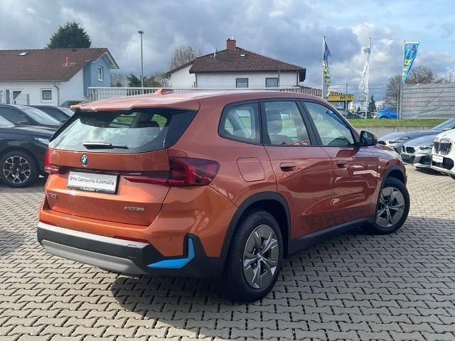 Używany BMW iX1 Performance 200 kW (272 KM) 2023 Pomarańczowy SUV