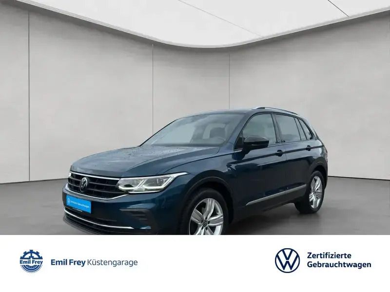 Blau Gebraucht 2022 VW Tiguan Active SUV | 25.950 € (Guter Preis) - Bild 1/4