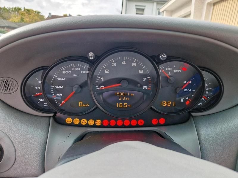 Second-hand Porsche 996 320 CP (235 kW) 2003 Portocaliu Coupe