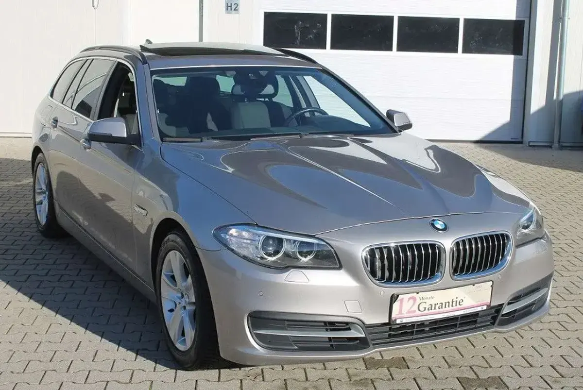 Second-hand BMW 520 Comfort Edition 184 CP (135 kW) 2014 Argintiu Break