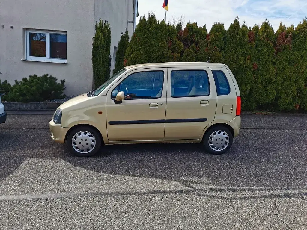 Używany Opel Agila 80 KM (58 kW) 2005 Żółty Minivan