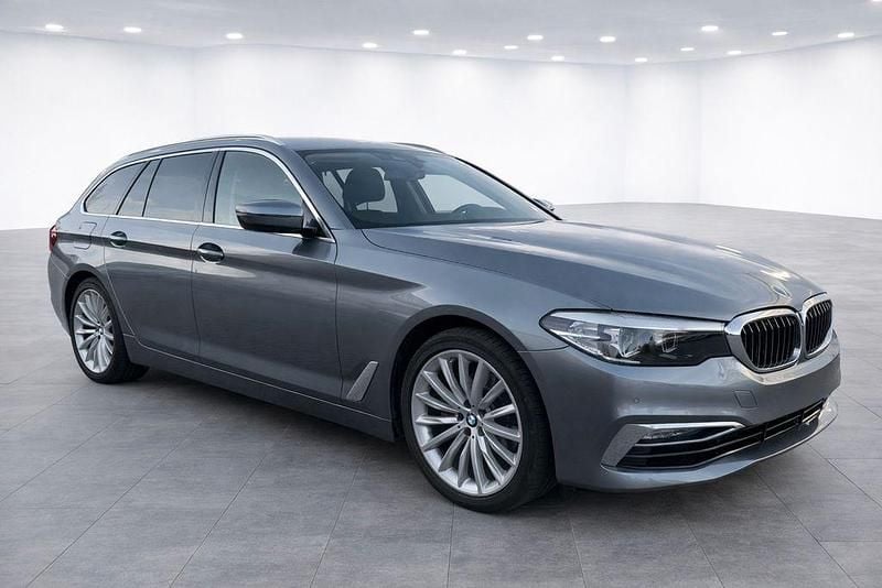 Second-hand BMW 520 Luxury Line 190 CP (139 kW) 2019 Gri Break