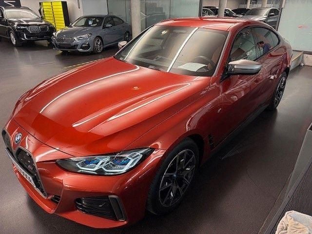Orange Gebraucht 2024 BMW i4 Shadowline Limousine | 47.999 € (Superpreis) - Bild 1/4