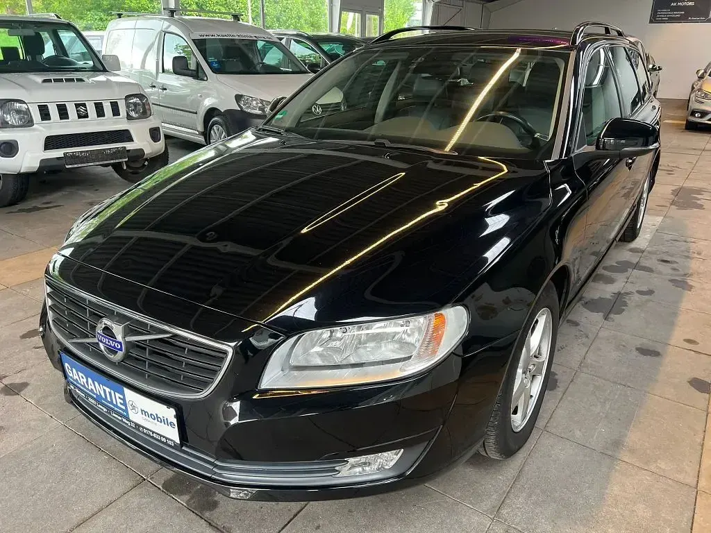 Używany Volvo V70 150 KM (110 kW) 2015 Czarny Kombi