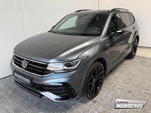 Grau Gebraucht 2024 VW Tiguan Allspace R-line SUV | 53.595 € - Bild 1/4