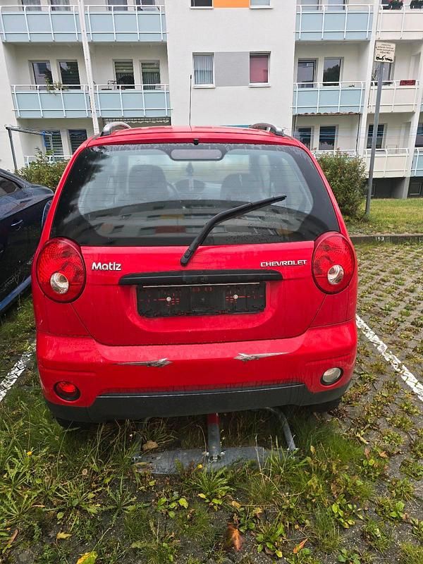 Rot Gebraucht 2009 Chevrolet Matiz SE Kleinwagen | 666 € - Bild 1/4