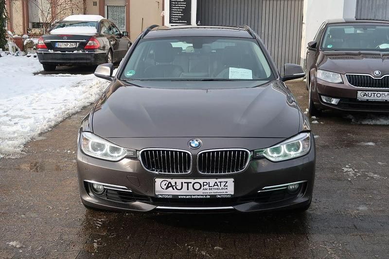 Gebraucht BMW 330 Luxury Line 258 PS (189 kW) 2013 Braun Kombi