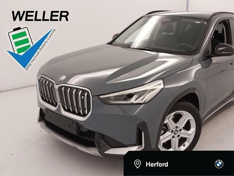 Storm bay (grau) Gebraucht 2023 BMW iX1 Comfort Edition SUV | 35.850 € (Superpreis) - Bild 1/3