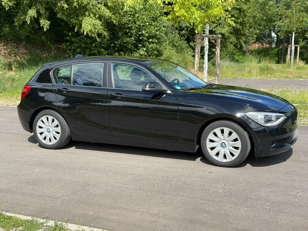 Gebraucht BMW 114 102 PS (75 kW) 2012 Schwarz Kleinwagen