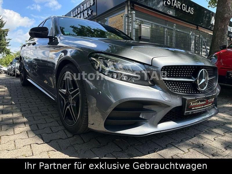 Grau Gebraucht 2021 Mercedes C220 AMG line Limousine | 35.990 € - Bild 1/4