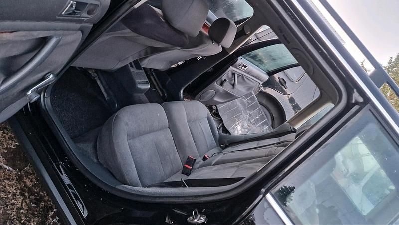 Second-hand VW Passat 101 CP (74 kW) 2004 Negru Break