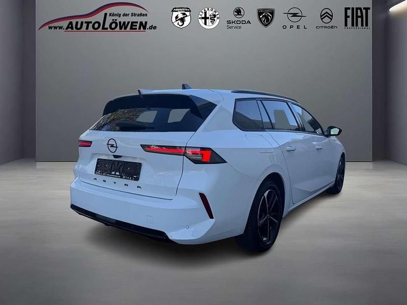 Gebraucht Opel Astra 131 PS (96 kW) 2024 Jade weiß (weiß) Kombi