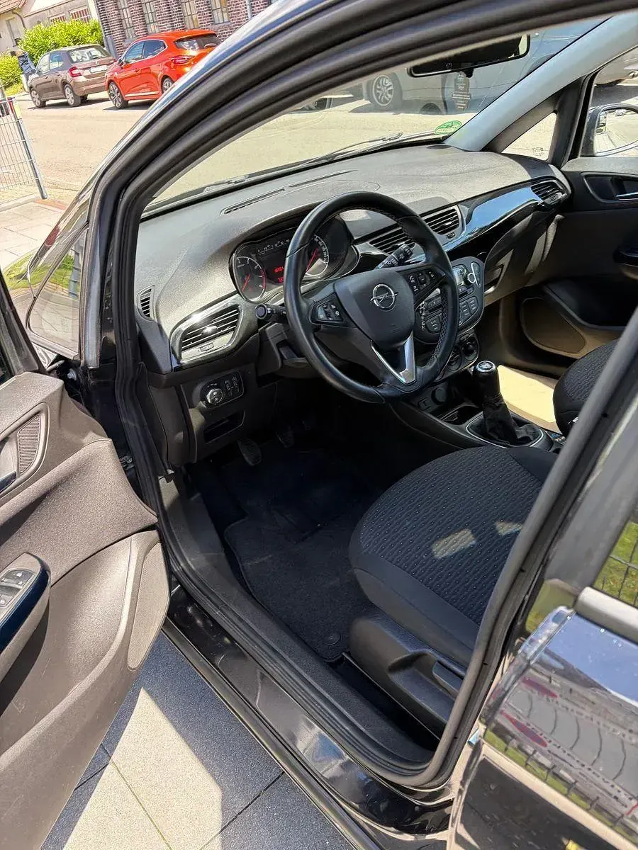 Gebraucht Opel Corsa drive 69 PS (50 kW) 2016 Schwarz Kleinwagen
