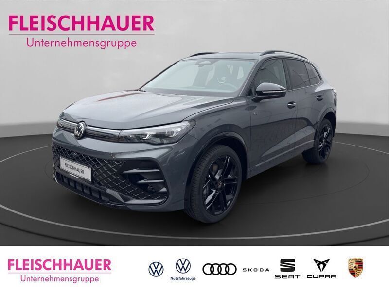 Grau Gebraucht 2024 VW Tiguan R-line SUV | 57.993 € (Teuer) - Bild 1/4