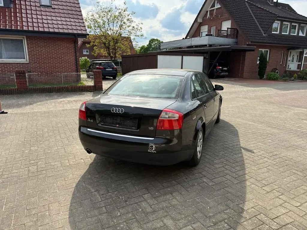 Używany Audi A4 Performance 102 KM (75 kW) 2004 Czarny Sedan/Limuzyna