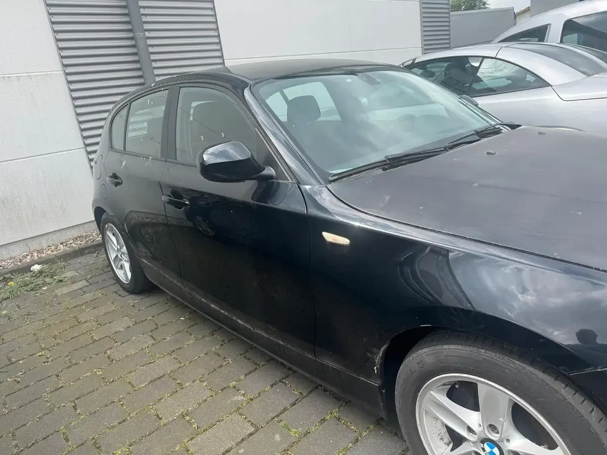 Gebraucht BMW 116 116 PS (85 kW) 2009 Schwarz Kleinwagen