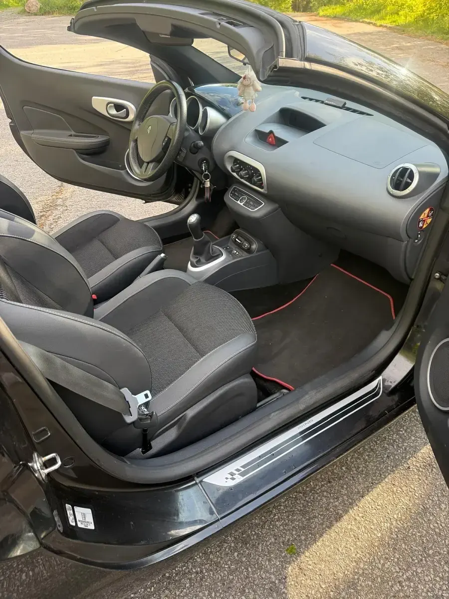Gebraucht Renault Wind 101 PS (74 kW) 2011 Schwarz Cabrio