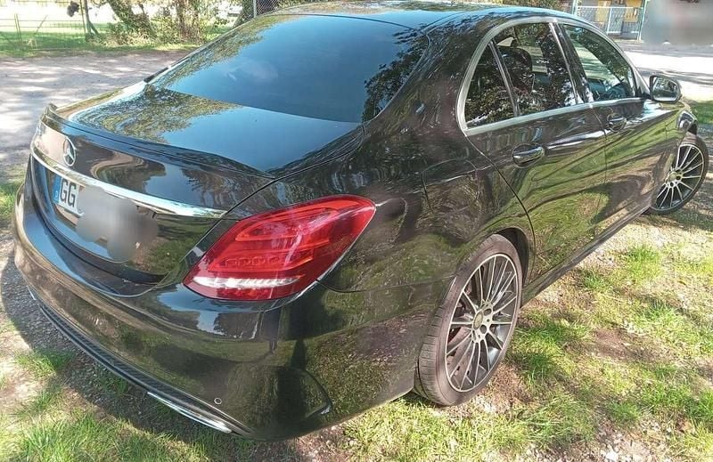 Schwarz Gebraucht 2014 Mercedes C200 AMG line Limousine | 12.499 € (Guter Preis) - Bild 1/4