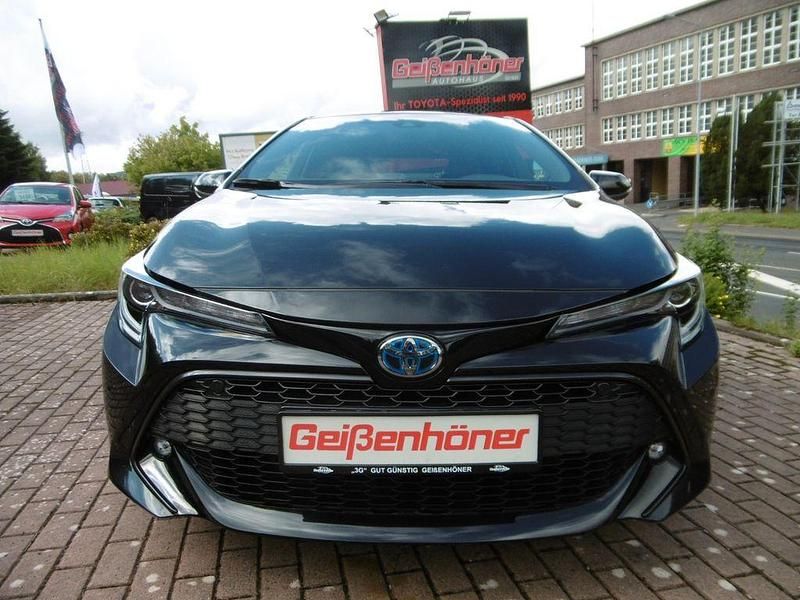 Schwarz Gebraucht 2021 Toyota Corolla Hybrid Team Limousine | 18.890 € (Fairer Preis) - Bild 1/4