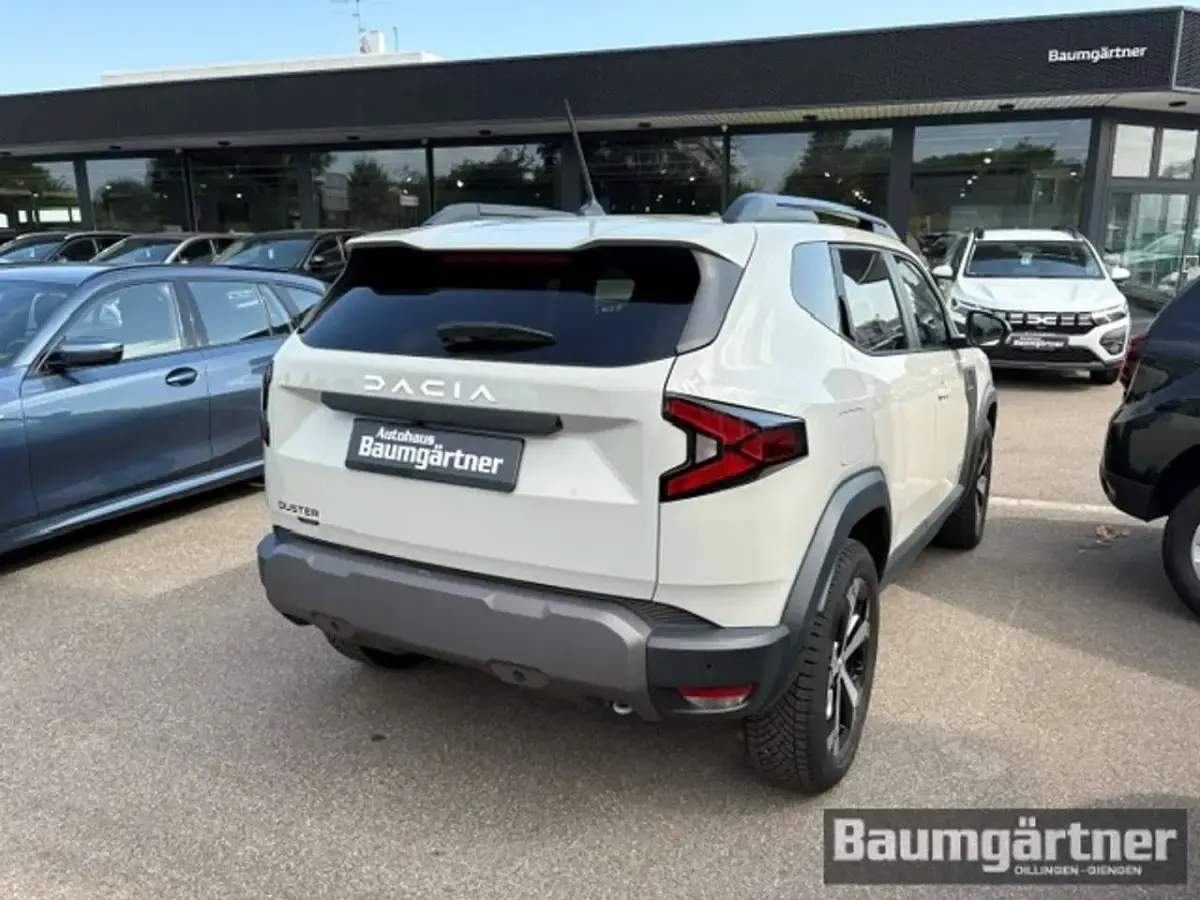 Gebraucht Dacia Duster Journey 141 PS (103 kW) 2025 Sandstonebeige metallic SUV