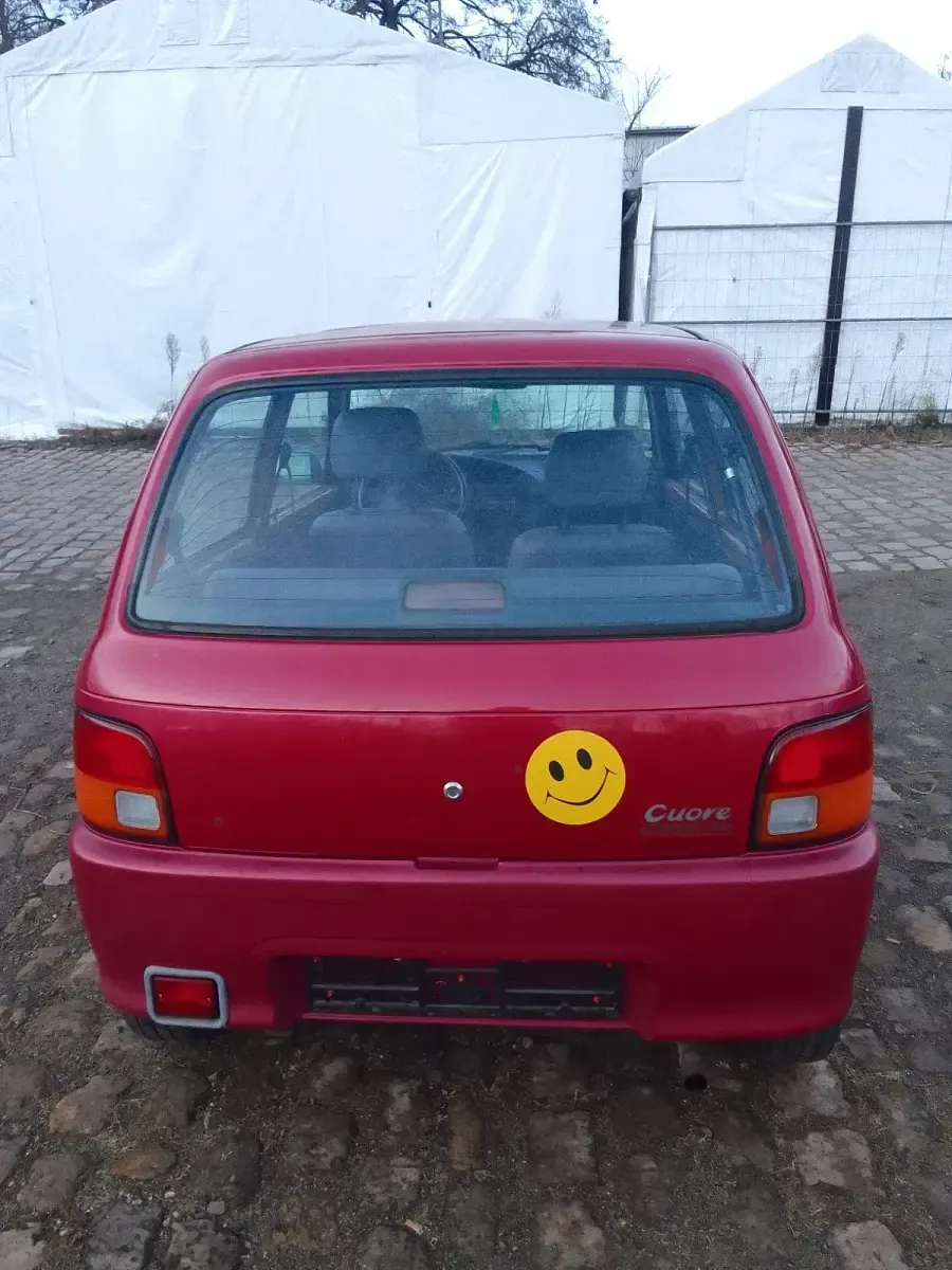 Gebraucht Daihatsu Cuore 43 PS (31 kW) 1998 Rot Kleinwagen