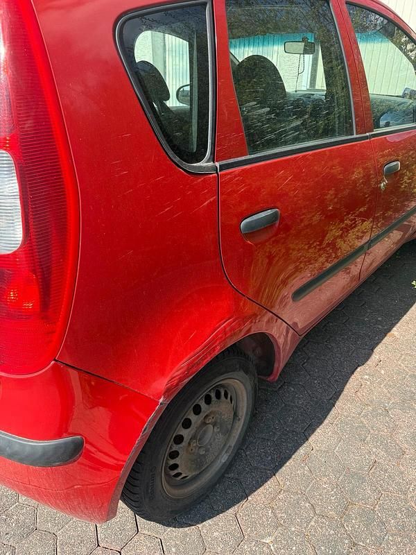 Gebraucht Mitsubishi Colt 75 PS (55 kW) 2004 Rot Kleinwagen