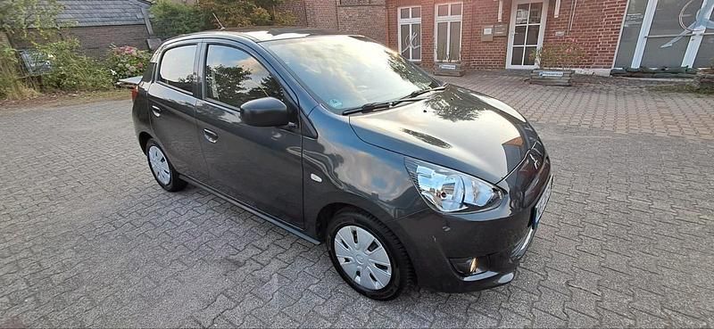 Grau Gebraucht 2014 Mitsubishi Space Star Kleinwagen | 4.399 € (Fairer Preis) - Bild 1/4