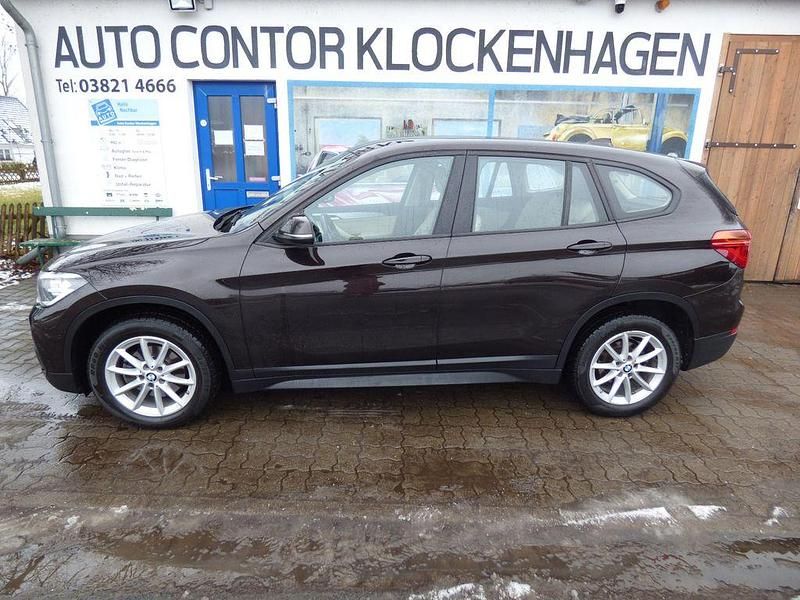 Braun Gebraucht 2016 BMW X1 Performance SUV | 14.800 € (Fairer Preis) - Bild 1/4