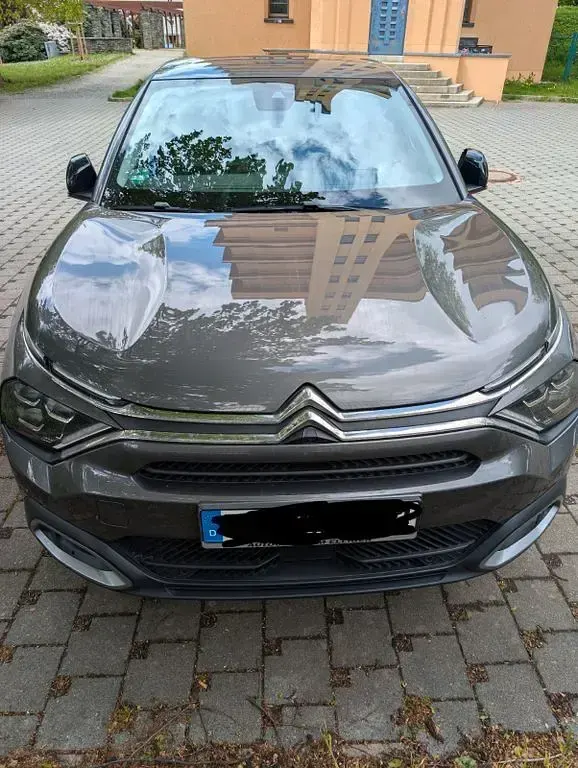 Używany Citroën e-C4 100 kW (136 KM) 2024 Szary Sedan/Limuzyna