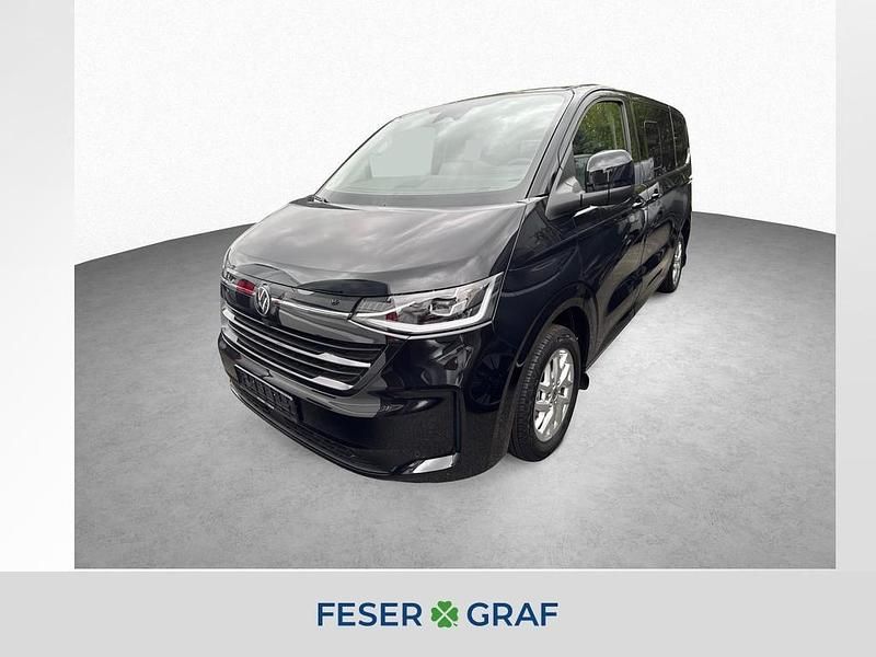 Midnight black metallic Neu 2025 VW Caravelle Van / Kleinbus | 86.051 € - Bild 1/4
