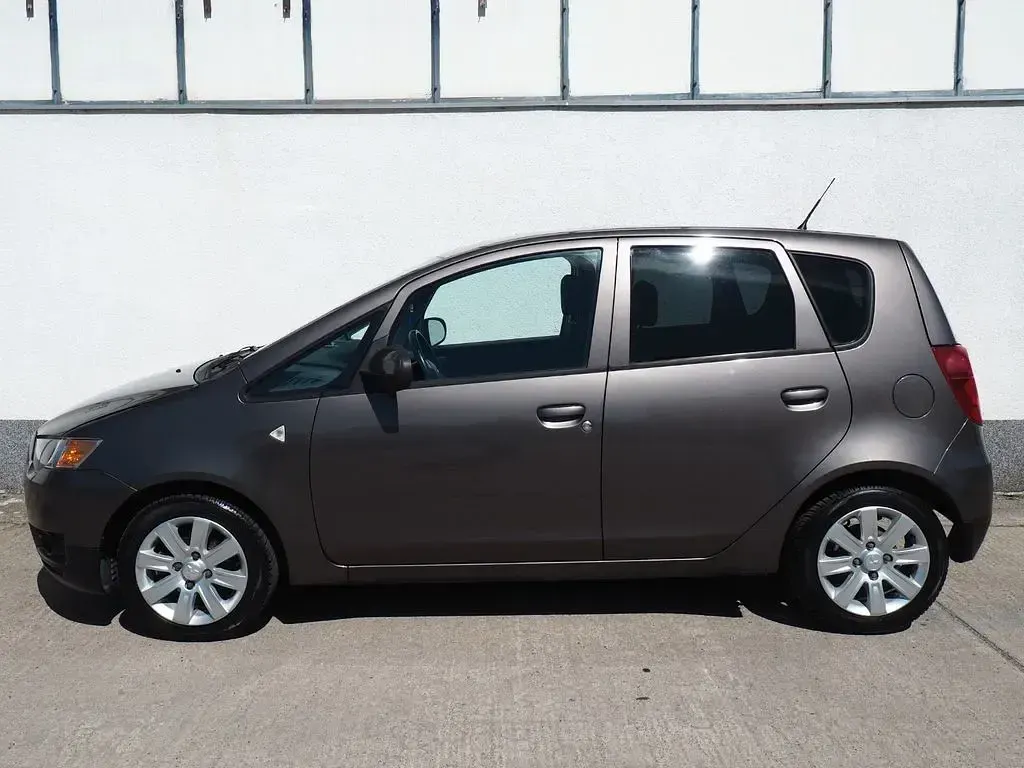 Gebraucht Mitsubishi Colt Motion 95 PS (69 kW) 2011 Braun Kleinwagen