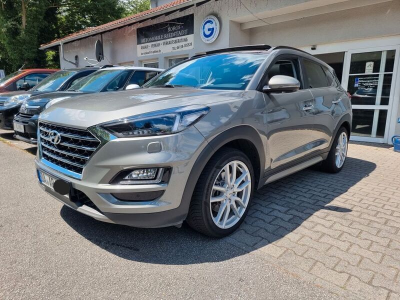 Grau Gebraucht 2018 Hyundai Tucson Premium SUV | 21.900 € (Teuer) - Bild 1/4
