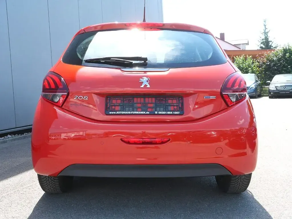 Gebraucht Peugeot 208 Active 82 PS (60 kW) 2018 Orange Kleinwagen